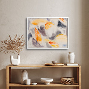 abstract fish painting over a bookshelf