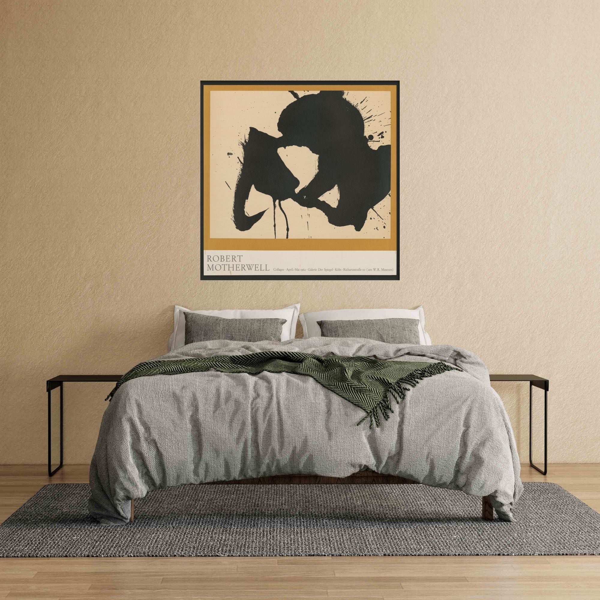 Gold and black abstract Motherwell poster over the bed in a Japandi bedroom