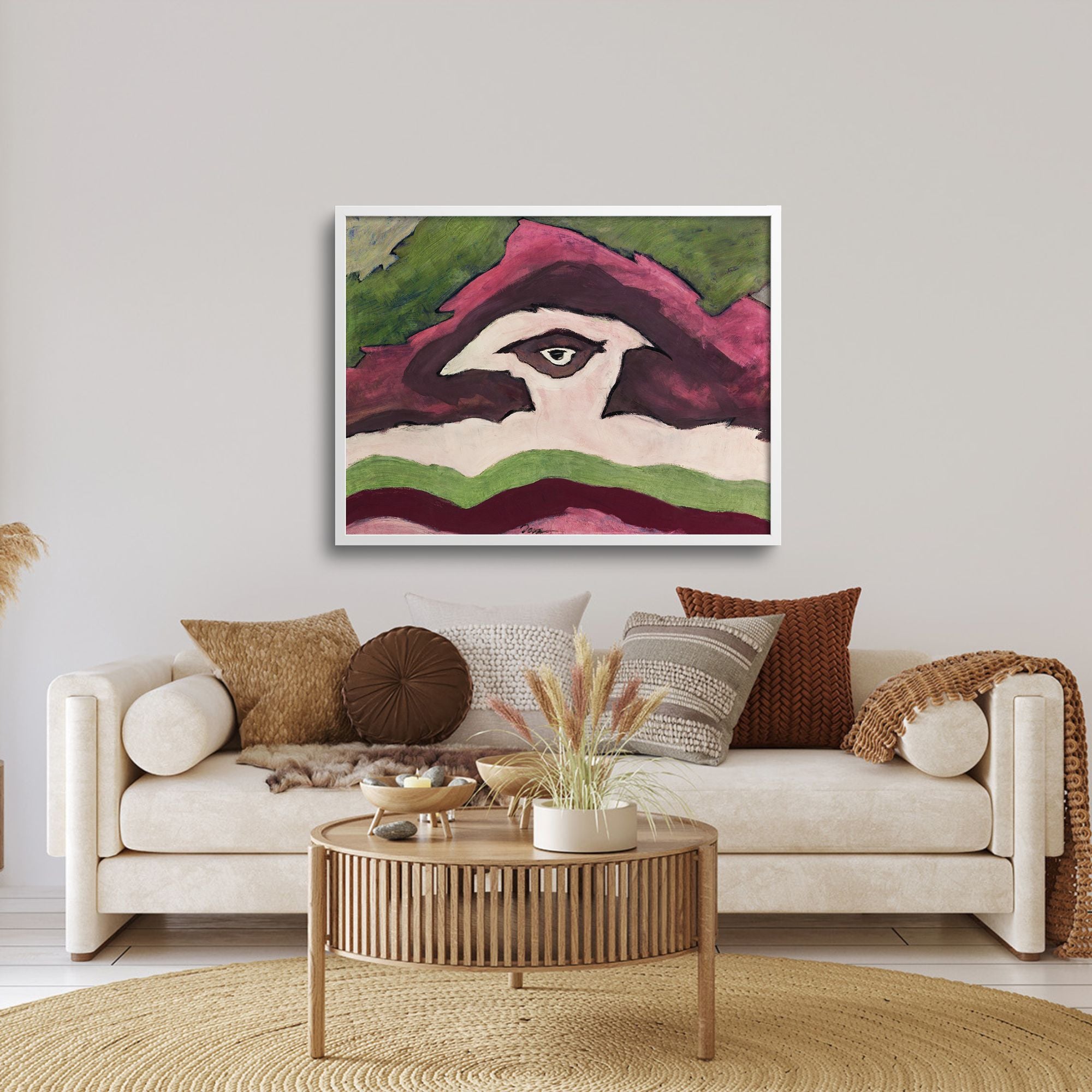 Cream couch with plum and gold pillows and Arthur Dove's Storm Clouds.