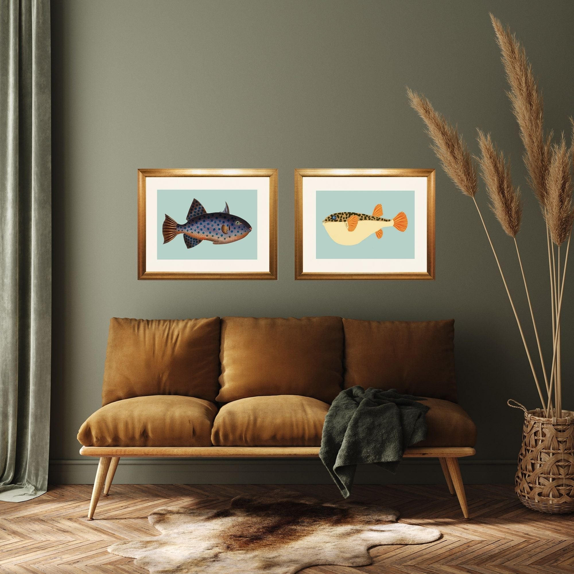 Framed puffer fish and polka dot fish in a living room.