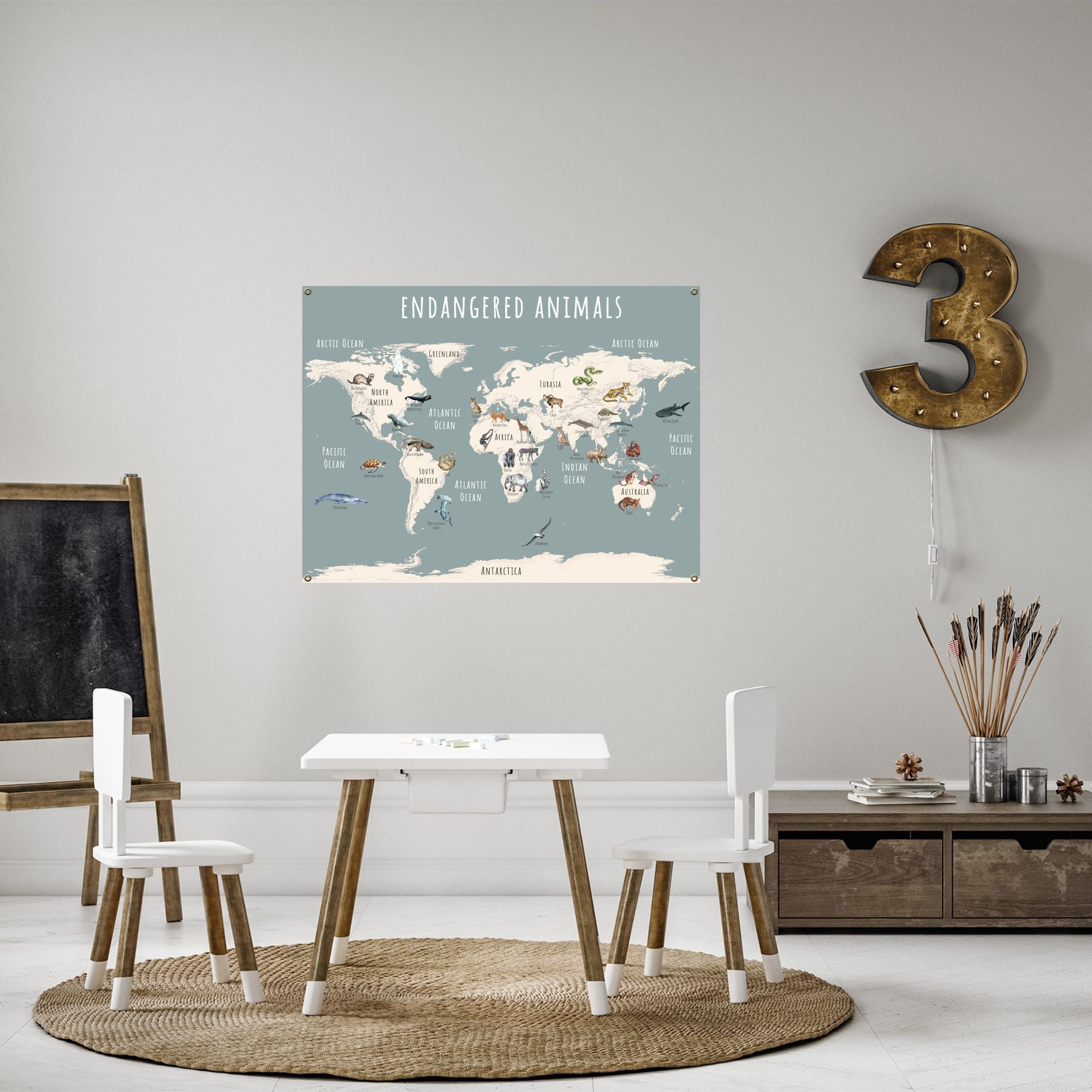 Endangered animals world map poster in a children's playrrom.