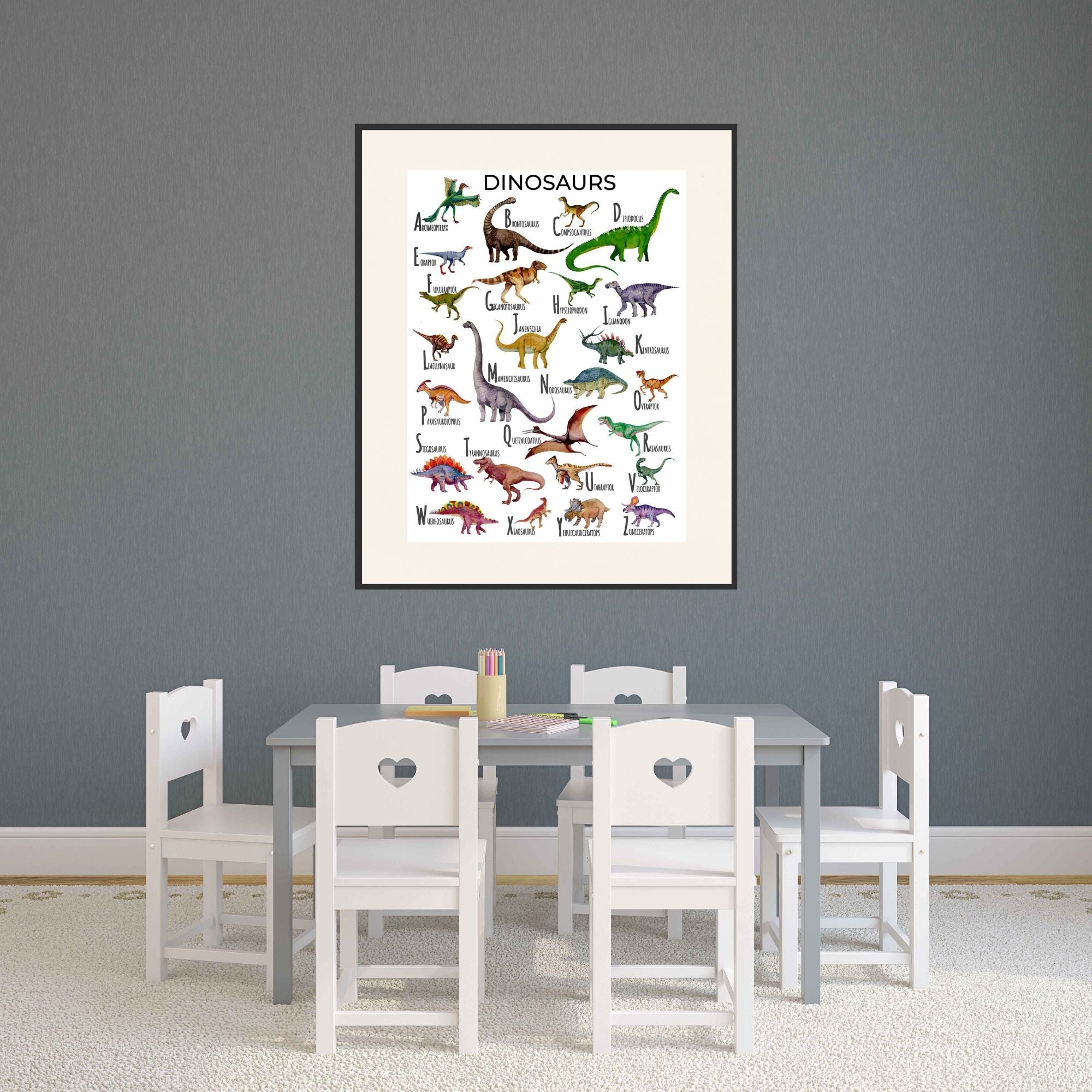 Dinosaur alphabet poster in a playroom.
