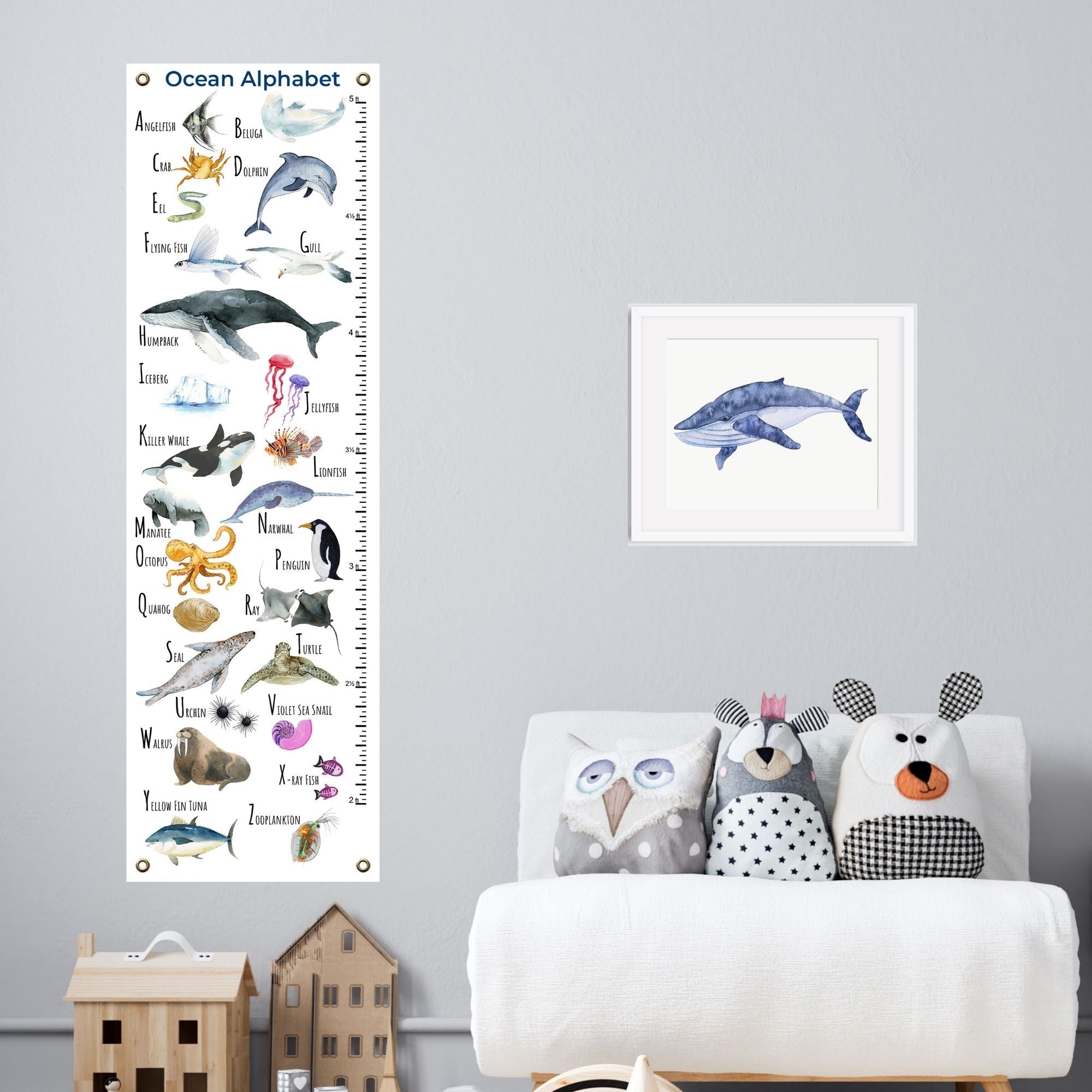 ocean alphabet canvas growth chart in a child's playroom