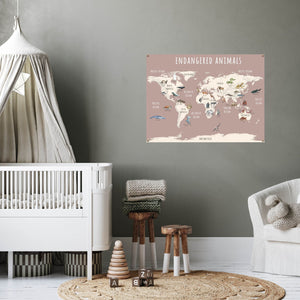 Pink endangered animals world map in a baby's nursery.