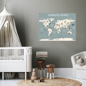 Endangered animals world map poster in a baby's nursery.
