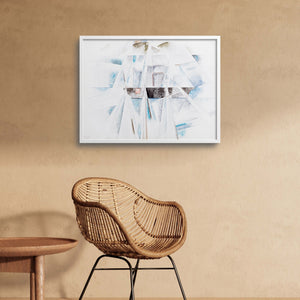 Charles Demuth schooner abstract art print next to a chair.