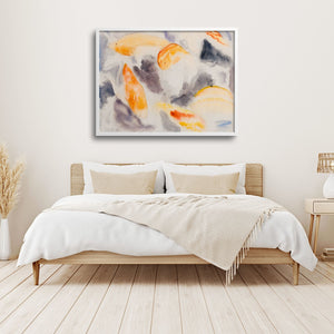 tropical fish art print in a light bedroom