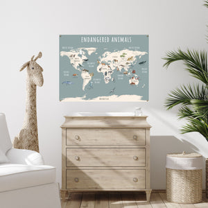 Canvas endangered animals world map hanging over a dresser in a child's room.