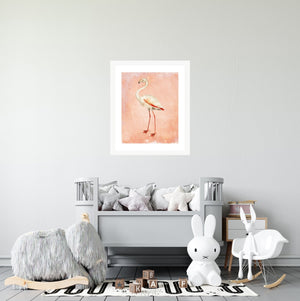 Pink flamingo art print in a toddler's room.