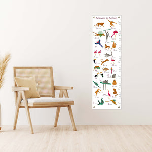 animal alphabet toddler's growth chart next to a chair