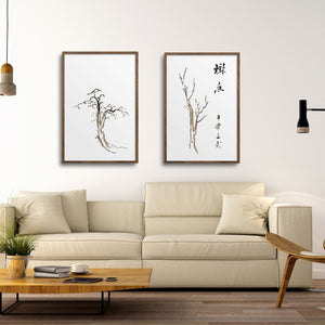 Pair of framed Japanese trees in a modern living room.