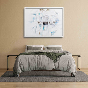 Abstract schooner art print over a bed.