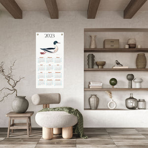 Japandi living room with Calendar featuring Rudbeck's Goosander Duck. 