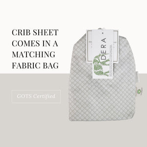 Grey Shibori crib sheet matching fabric bag.